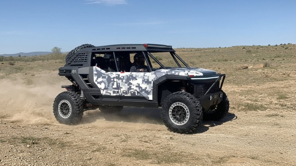 Toyota Scion 01 Concept SxS kicking up dust while driving on a dry, open trail in a desert landscape, showcasing its digital camo livery and driver in action.