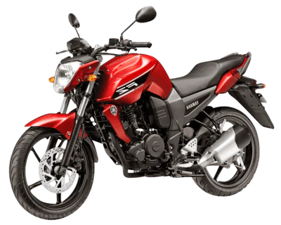 Red sport motorcycle photographed from the side, showing a black seat, engine, and front disc brake; Yamaha branding visible on the body.
