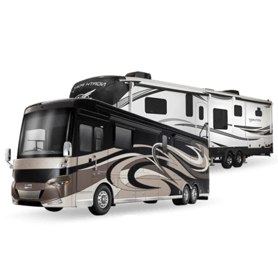 A large beige and brown motorhome hitched to a white and gray travel trailer side by side.