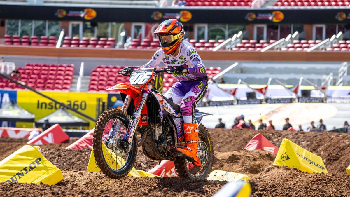 Marcus Phelps on a Dirt Legal KTM dirt bike navigating a rough section of the Salt Lake City Supercross track at Rice-Eccles Stadium